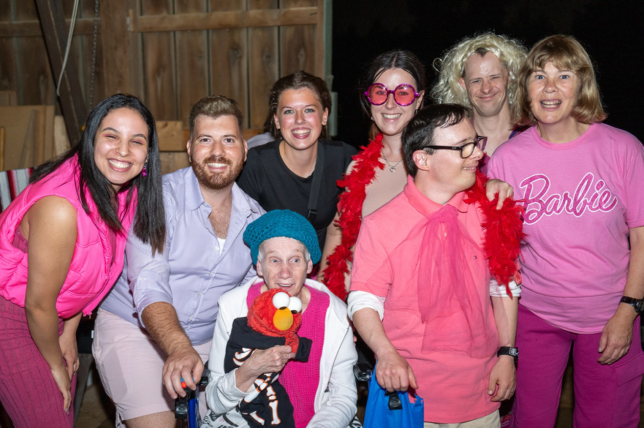 Daybreak - a group of community members at a party