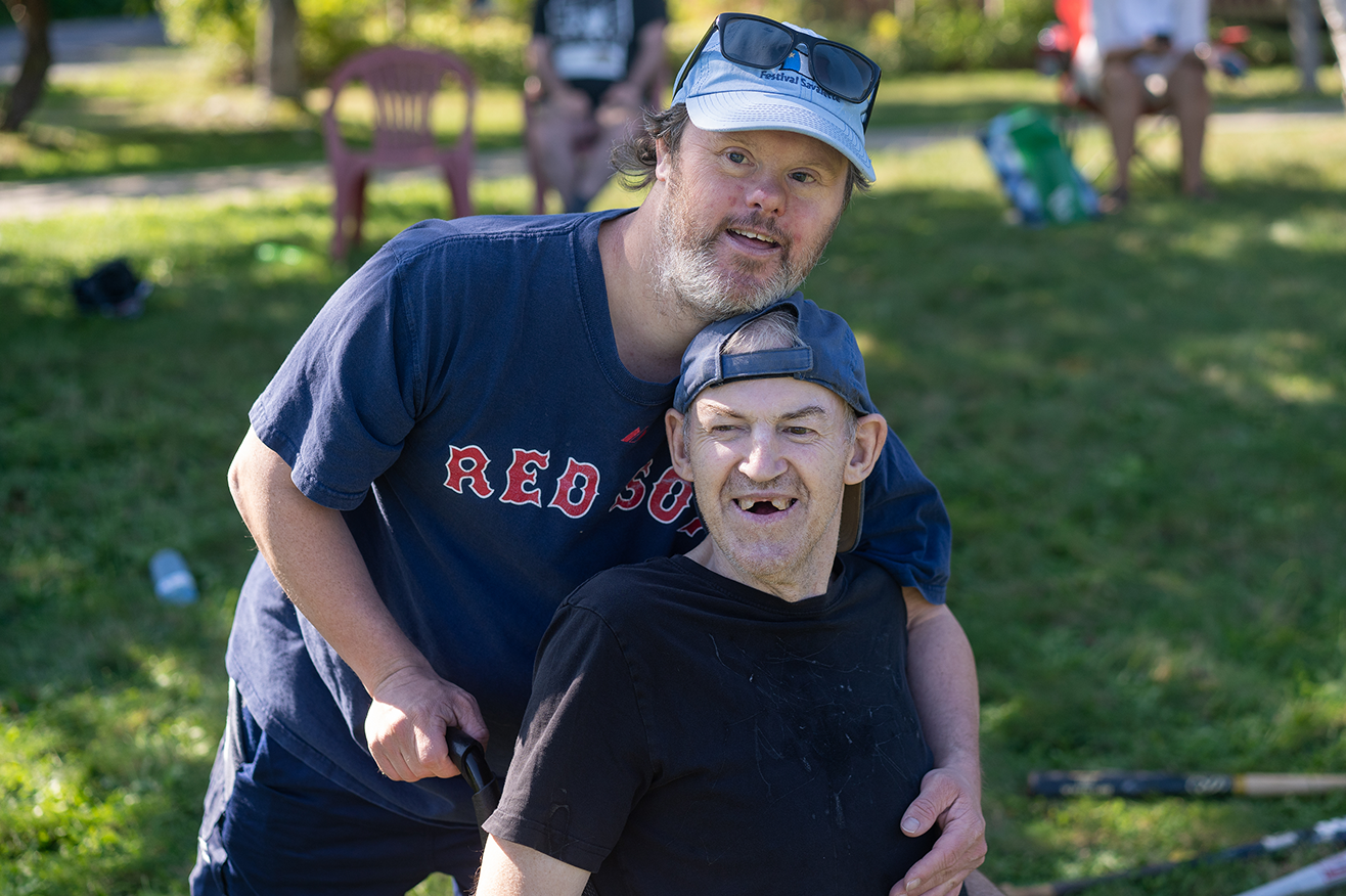 Cape Breton - Two coremembers hugging outside